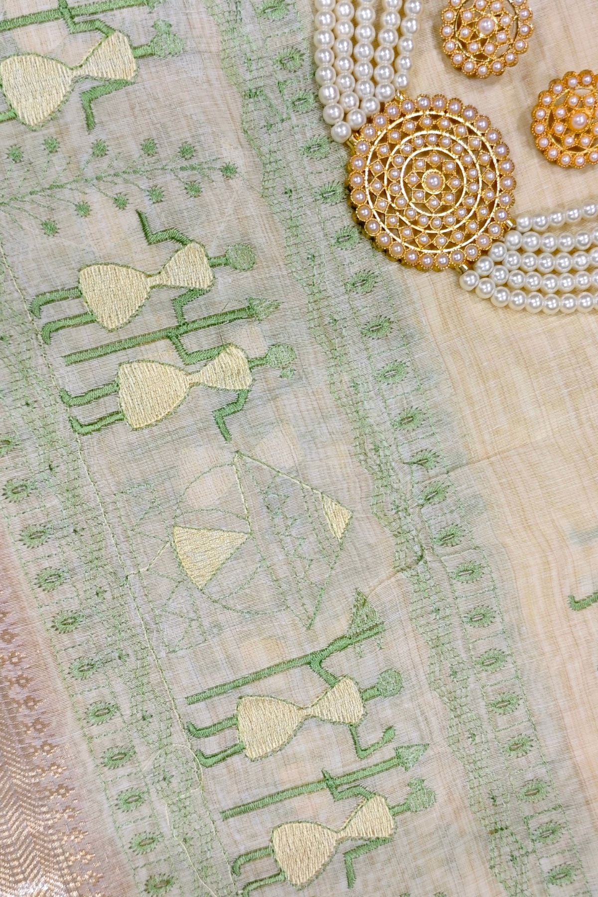 Ivory Cotton Saree with Green Warli Art