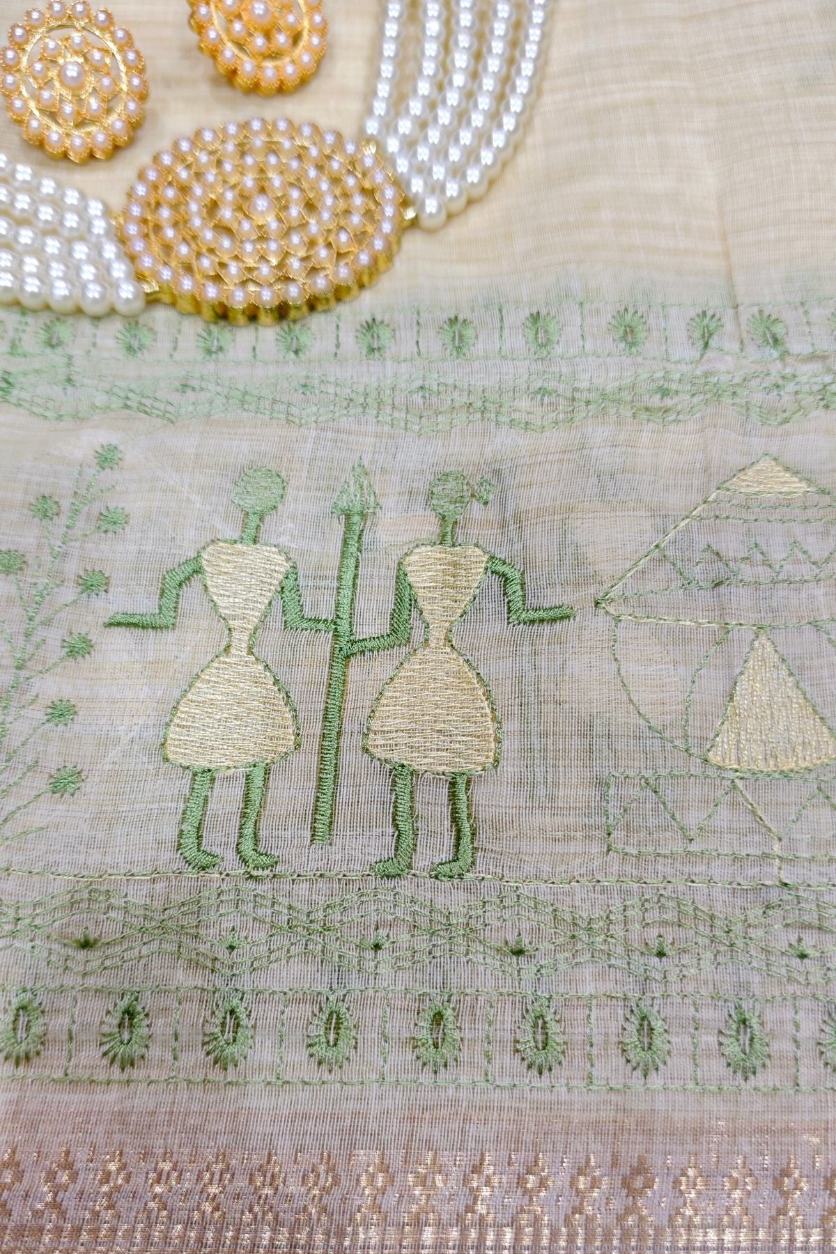 Ivory Cotton Saree with Green Warli Art